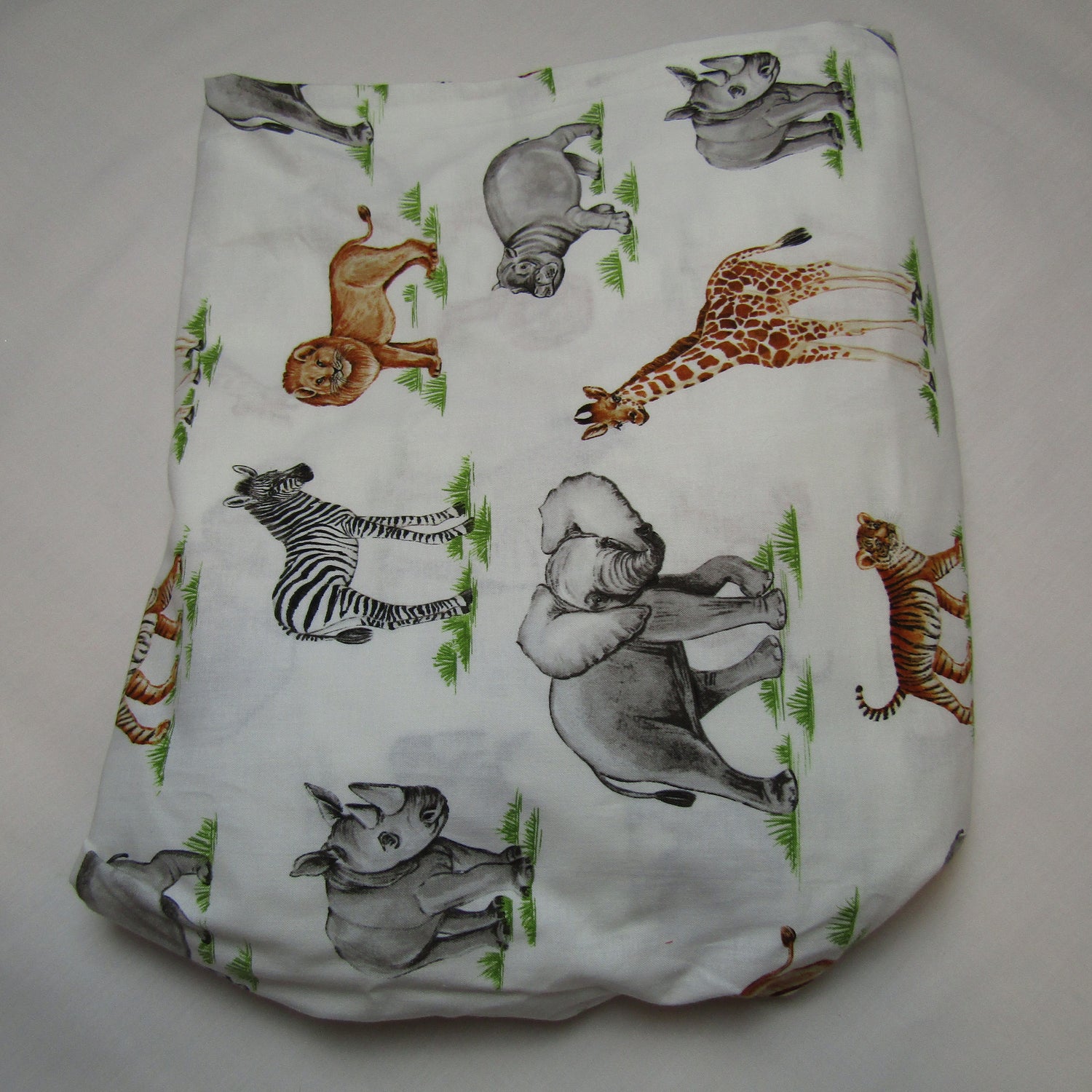 Fitted crib sheets with zoo animals.